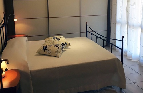 Province of Cagliari Apartment | Apartment in villa with garden and jacuzzi