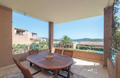 Porto Pozzo Apartment | Apartment 'Il Fiordo 16' with Sea View, Shared Pool and Air Conditioning
