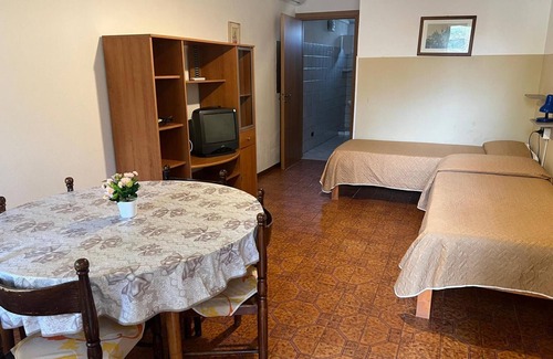 Calimera Apartment | Apartment 'La Quiete - Veranda Piccola 4' with Shared Pool, Wi-Fi and Air Conditioning