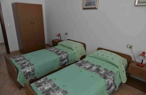 Bari Sardo Apartment | Apartment 'Mare Blu - Quadrilocale Primo Piano' with Shared Garden and Wi-Fi