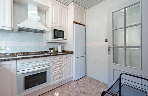 Comarruga Apartment | Apartment 'Near Beaches Large Private Patio' with Shared Pool, Wi-Fi and Air Conditioning