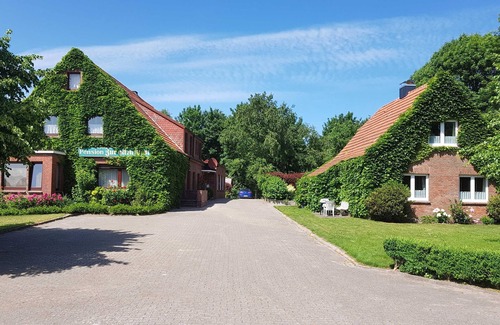 Dornumergrode Apartment | Apartment West - Guesthouse Zur alten Post