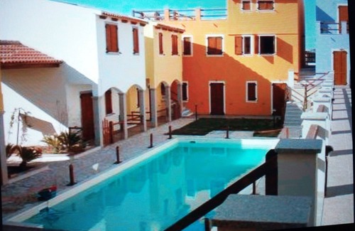 Viddalba House | Apartment with communal pool, garden and terrace overlooking the hills