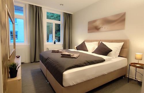 Celle Apartment | ApartZ - Celle Altstadt - bis 9 Personen, 3 SZ, Infrarotsauna, Parkplatz, W-LAN, Dachterrasse