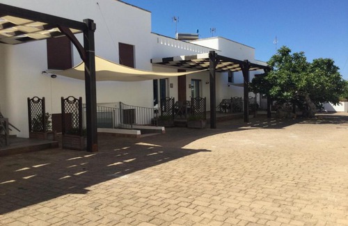 Posto Rosso House | Appartamenti a 50 mt dal mare a Posto Rosso