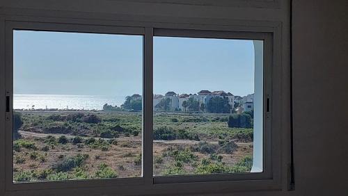 Achakkar Apartment | Appartement 2 avec piscines, vue sur mer et accès à la plage à Achakar Hill, Tanger