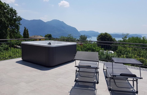Cresseglio Apartment | Approx. 210 m² 6½-room house unit with large sun terrace with whirlpool and dream lake view