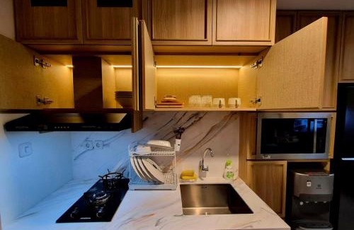Pondok Aren Apartment | Apt Embarcadero 2BR with Wi-Fi & Pool ByDamaresa