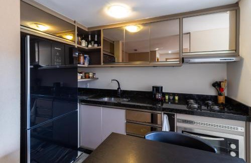 Garcia Apartment | Apto a 10 min da Vila Germânica, dois quartos, salas de estar e jantar, cozinha completa, sacada com churrasqueira, Wi-Fi, Piscina, academia, mercadinho 24 horas e Vaga de garagem