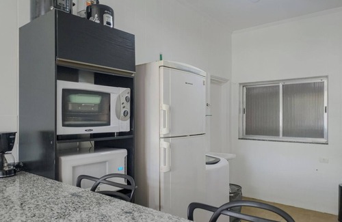 Embare Apartment | Apto completo no Embaré: Beira Mar | Ar | Garagem