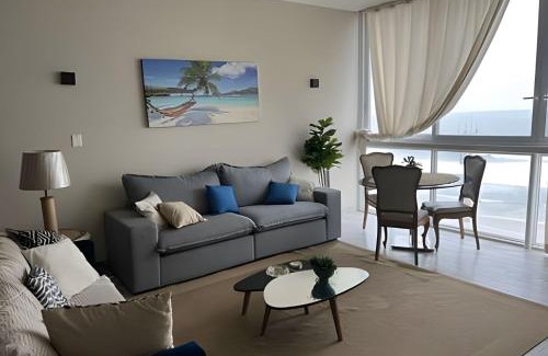 Centro House | Apto vista mar em Pitangueiras, Guarujá