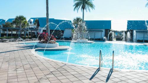 Panama City Beach House | Arcade Bar Prominence Resort Pool and Gym Access Close to Beach Sea Happy