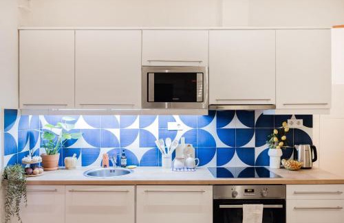 Belso-Ferencvaros Apartment | Artful 3BR Home by Danube River & Market Hall