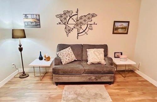 North Glenmore House | Artistic and stylish english charm backyard private guest house with master bedroom and living room