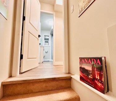 North Glenmore House | Artistic and stylish english charm backyard private guest house with master bedroom and living room