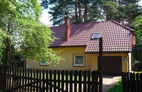 Spychowo House | at the lake with a boat