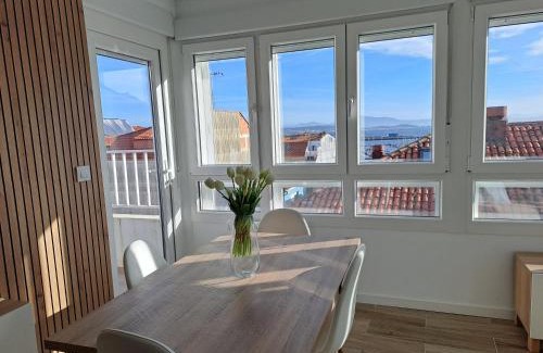 Puebla del Caraminal Apartment | Atico con vistas a la Ría