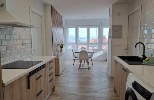 Puebla del Caraminal Apartment | Atico con vistas a la Ría