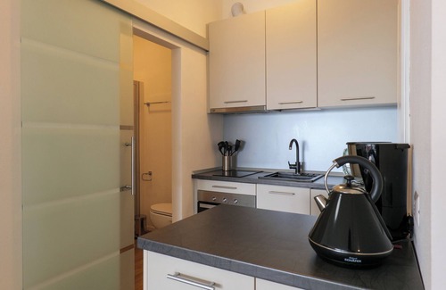 Susello Apartment | Attractive studio with balcony, pool and dream view