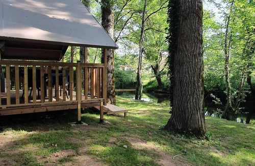 Le Change House | Auberoche campsite * - MINI-WOOD LODGE TENT on canvas stilts, without toilets, for 4 people 4 people
