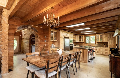 Traverse Bay Cottage | Authentic & Stunning, Rustic Log House located on 28 acres with private road