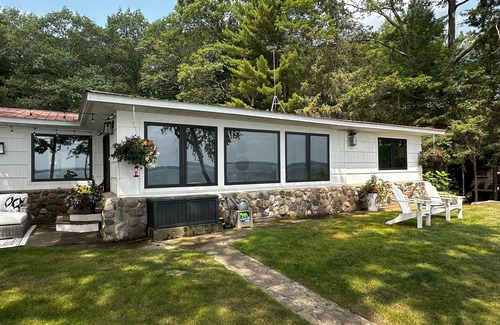 Hayward Cabin | AVAILABLE – Lakefront Retreat: Dock, Designer Kitchen, & Sunrises to Remember.