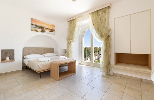 Pittuini House | B&B I Tarocchi - Suite La Forza