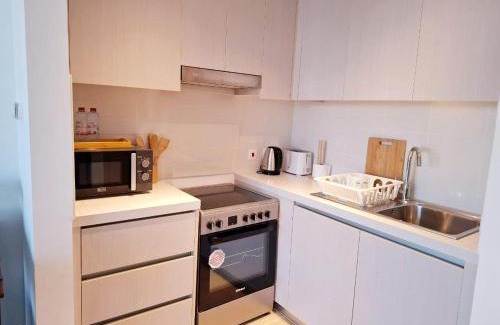 Abu Dhabi Apartment | B11 Comfy Studio With Canal and Pool View