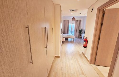 Abu Dhabi Apartment | B11 Comfy Studio With Canal and Pool View