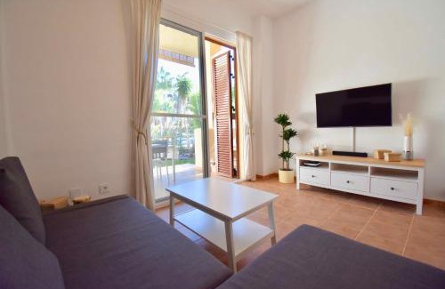 Puerto Rey Apartment | Bahia Marinas - Tu hogar con jardín privado!