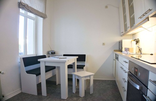 Gohren Apartment | Balcony, free use of the AHOI adventure pool and sauna -Residenz Strandeck FeWo01