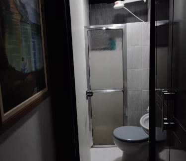 Aguas de Lindoia House | Bangalô - quarto Saxofone