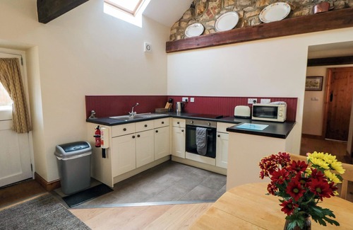 Whitby Cottage | BARN COTTAGE, pet friendly, with a garden in Robin Hood’s Bay