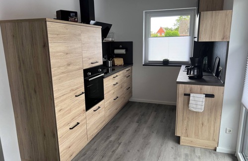 Pewsum House | Barrier-free vacation home with sun terrace, wallbox, family-friendly, new build