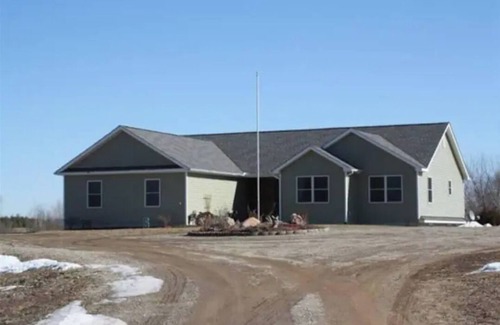 Grass Lake Apartment | Basement Bedroom Suite in the country with Hot Tub