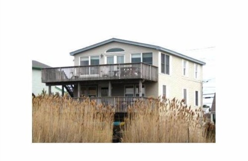 North Beach Haven Apartment | Bay Front Home with Amazing Sunset Views, Short block to Beach, centralA/C,kayak