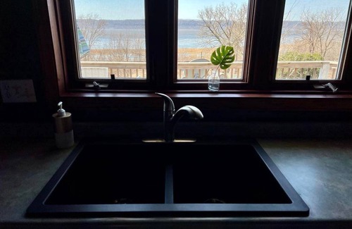 Ferryville House | Bayview House, Mississippi River view with year-round HOT TUB in screen porch