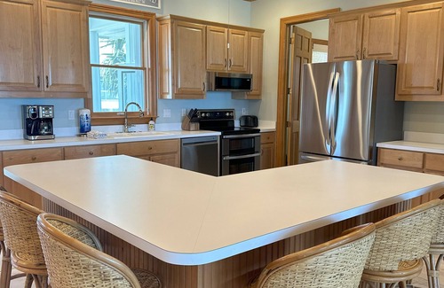 St. George Island House | Beach front, screened porch, elevator, and pet friendly!