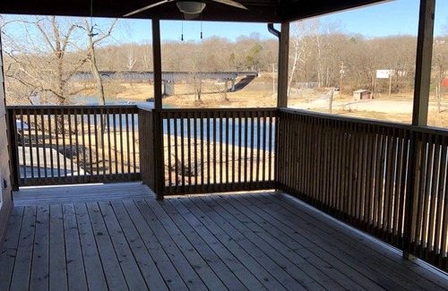 Pineville Cabin | Beach house-style cabin on the Elk River in Pineville, Missouri