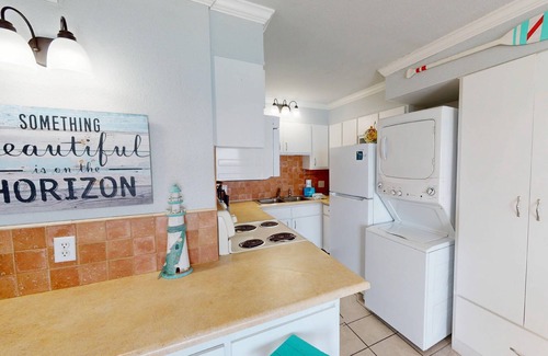 Panama City Beach Condo | Beachfront condo with a kitchen, located in a gated resort featuring pools, hot tub, and a tiki bar!