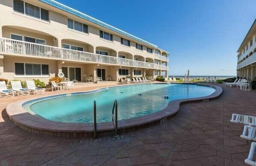 New Smyrna Beach Condo | Beachfront Comfort w/Pool, Balcony & Steps to Flagler Avenue