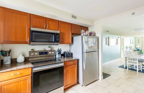 Ono Island Condo | Beachfront Condo ~ Ocean views ~ Pool & Beach ~Docks