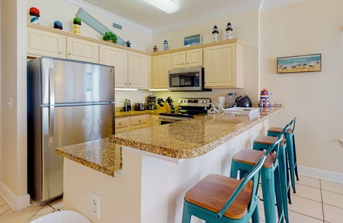 Gulf Shores Condo | Beachfront corner condo with amazing Gulf views, balcony, pools & hot tubs