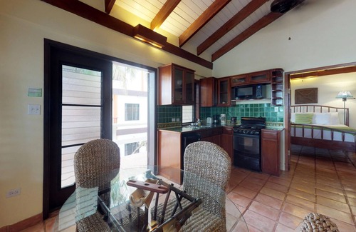 Placencia Condo | Beachfront, ocean-view getaway with shared pool, hammock, WiFi, & central AC