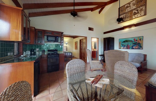 Placencia Condo | Beachfront, ocean-view getaway with shared pool, hammock, WiFi, & central AC