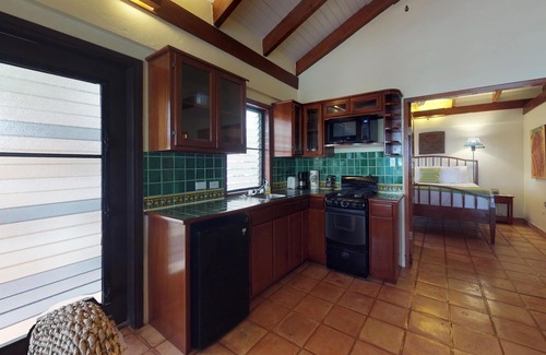 Placencia Condo | Beachfront, ocean-view getaway with shared pool, hammock, WiFi, & central AC