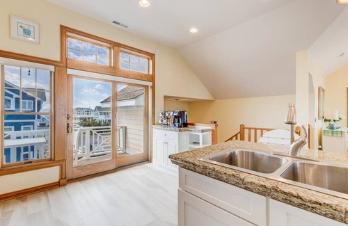 Buck Island House | Beachin Fun (North Unit) | 1665 ft to the beach | Hot Tub, Dog Friendly, and Community Pool