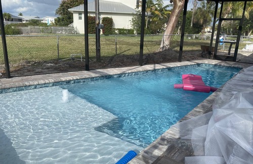 Goodland House | Beautiful canal facing home with inground pool! In charming Goodland Florida!