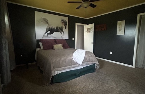 Beaver Dams House | Beautiful countryside home with spacious rooms and a large covered porch.