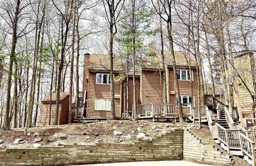 Maple City Condo | Beautiful & cozy condo with private wooded view deck @ The Homestead Resort